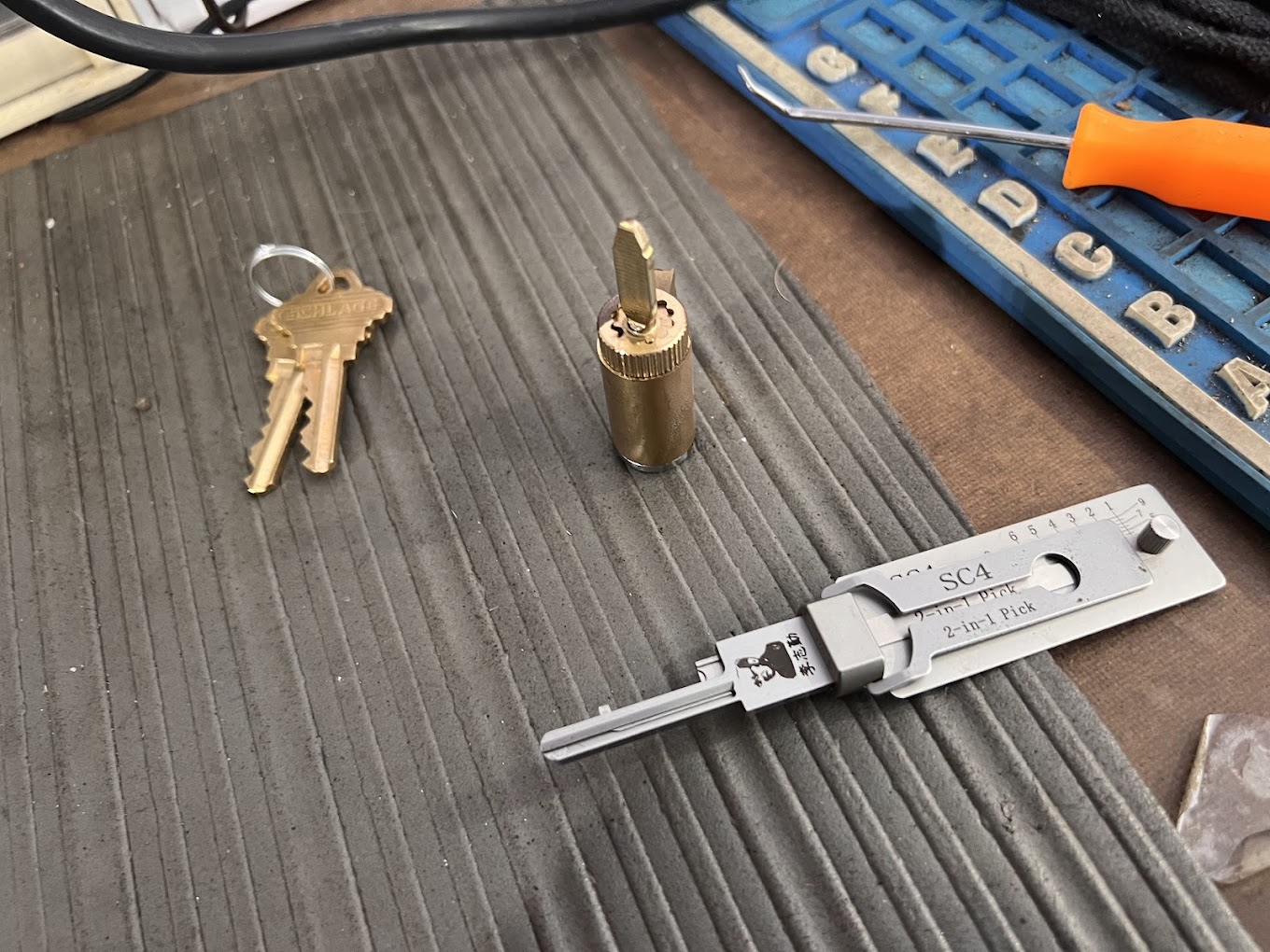 Locksmith performing non-destructive home lockout entry