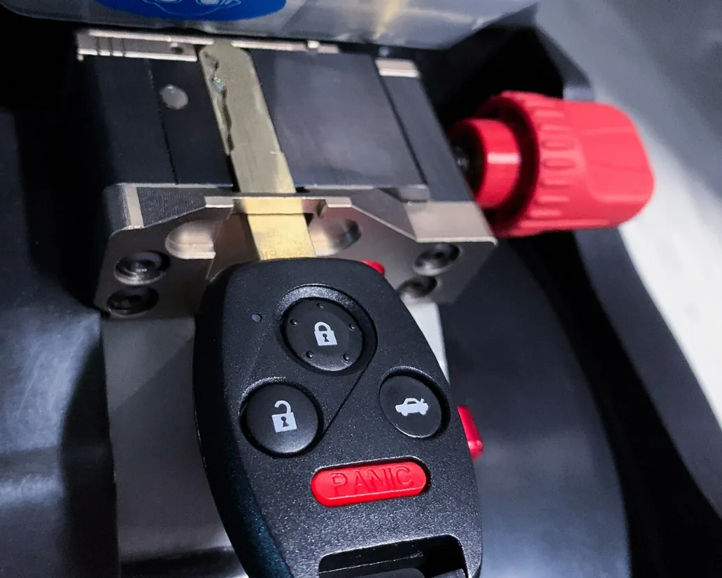 Mobile car key cutting service on a locksmith truck
