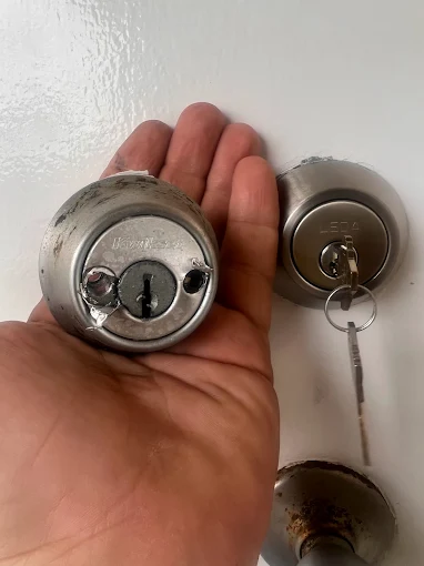 Grade 1 deadbolt being installed on a Grant-Valkaria front door