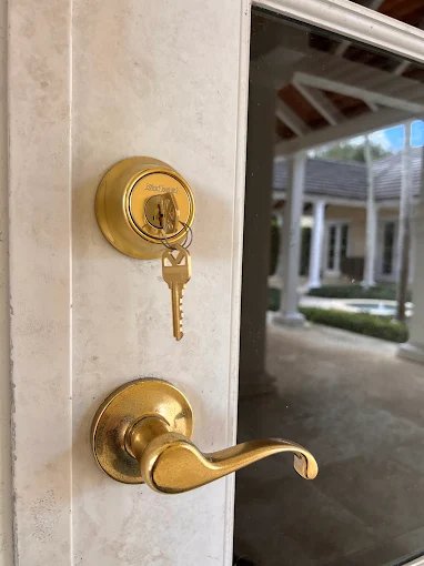 Grade 1 deadbolt being installed on a West Melbourne front door