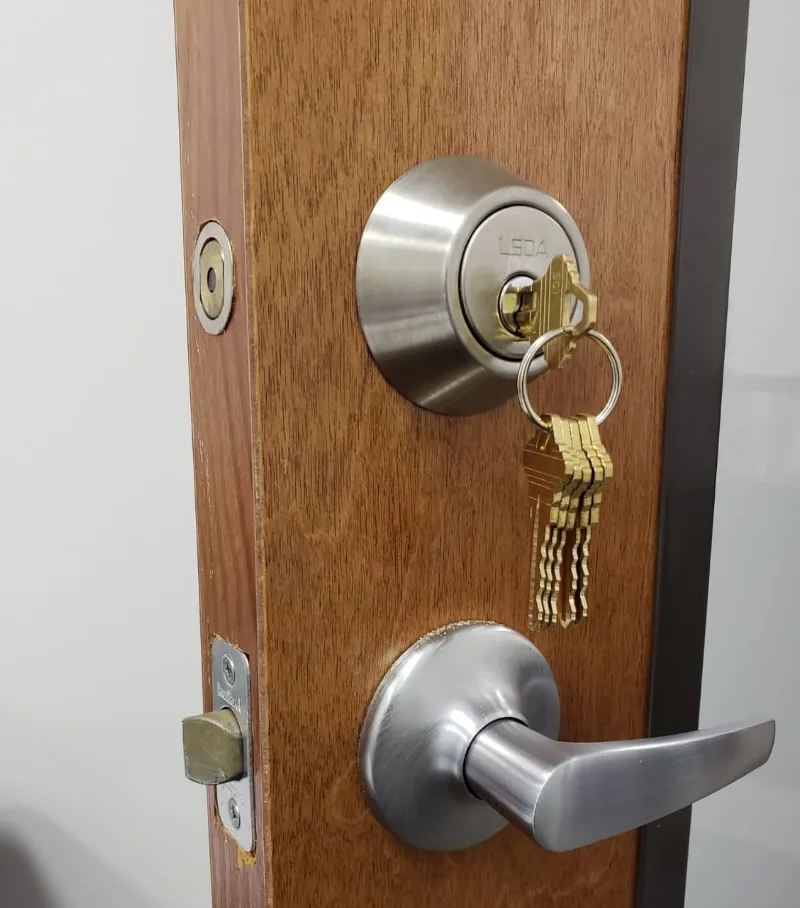 Grade 1 deadbolt installation on residential wood front door