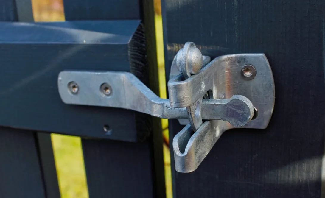 Gate lock installation on residential pool fence