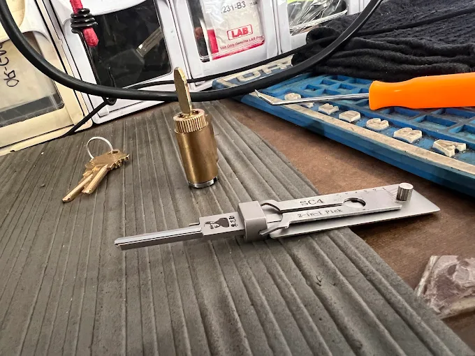 Locksmith rekeying a residential door lock cylinder in Viera, FL